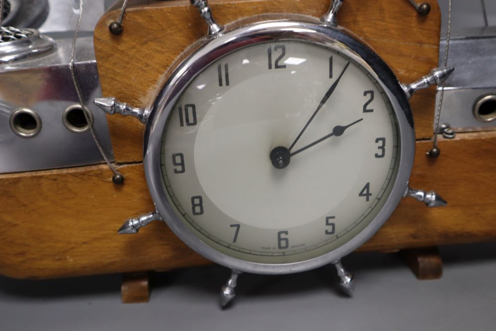 A novelty timepiece in the form a three-masted ship, Metamech Electric movement, 42cm